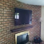 Tv over fireplace and hidden wiring